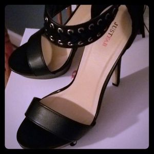 Black high heeled sandals